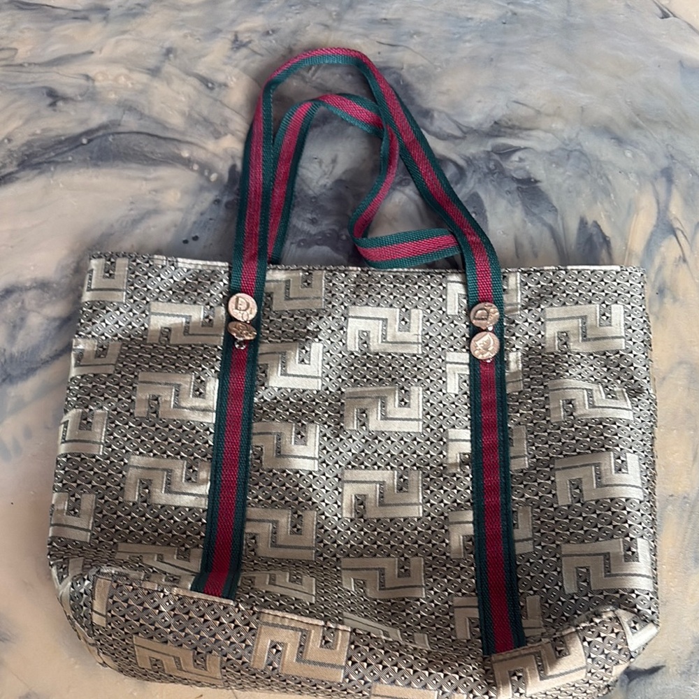 Stylish Silver Tote Bag with Green and Red Straps
